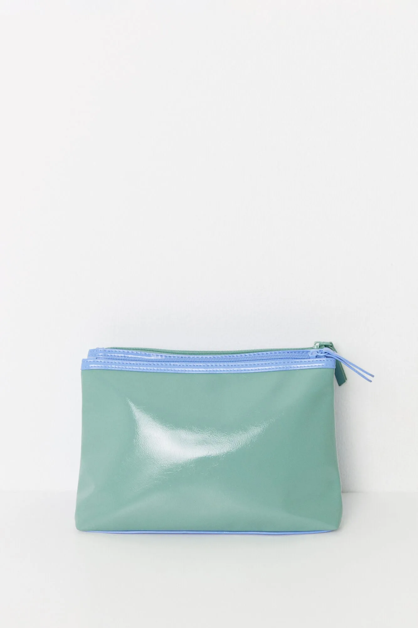 Medium blue and green patent leather toiletry bag