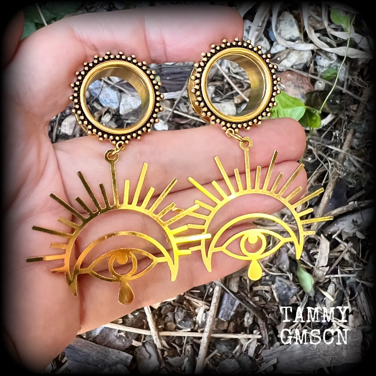 Oculus tunnel earrings-Evil eye ear gauges