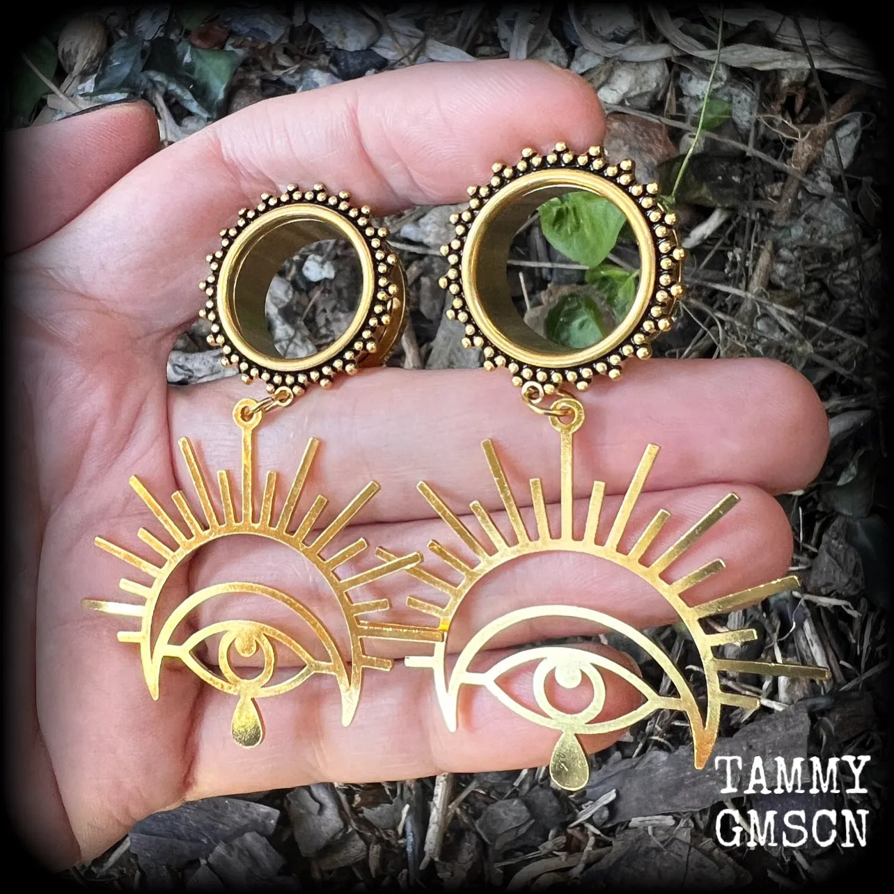 Oculus tunnel earrings-Evil eye ear gauges