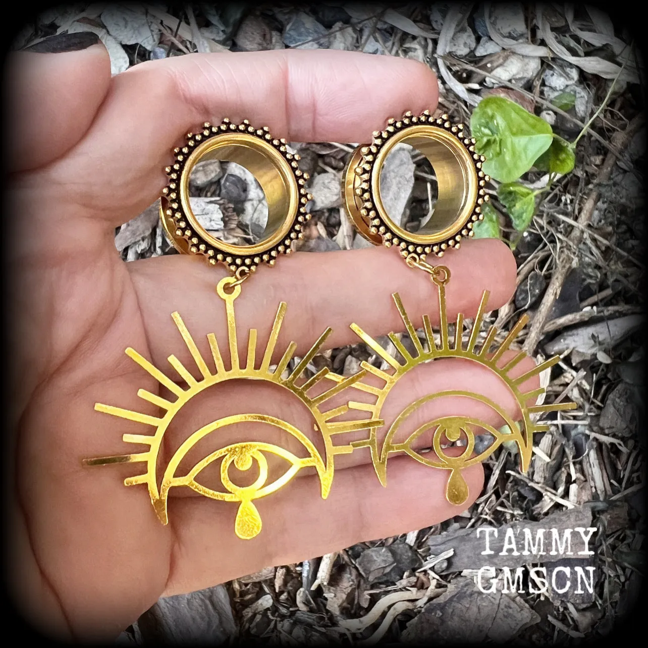 Oculus tunnel earrings-Evil eye ear gauges